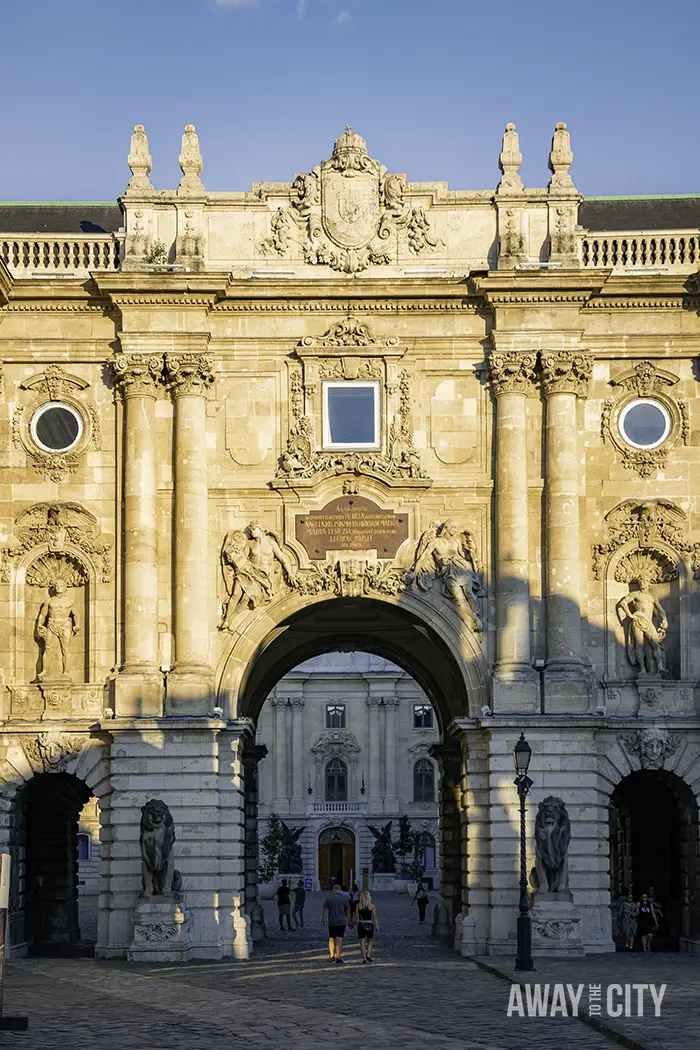 A gate of Buda Castle in Budapest, welcoming visitors to this iconic historical site.