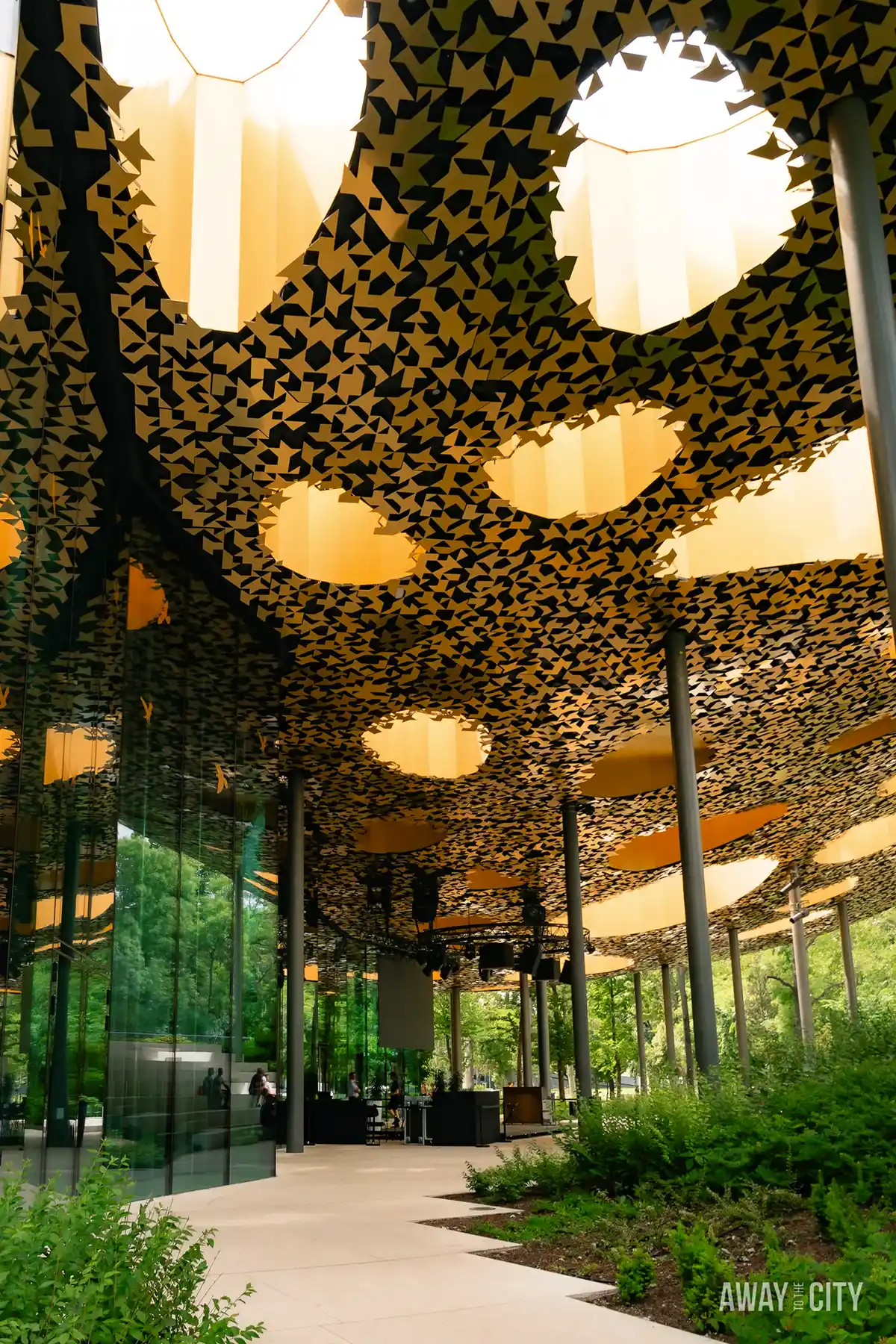 An image displaying the roof canopy of the House of Music in Budapest City Park, one of the best things to do on a Budapest city break.