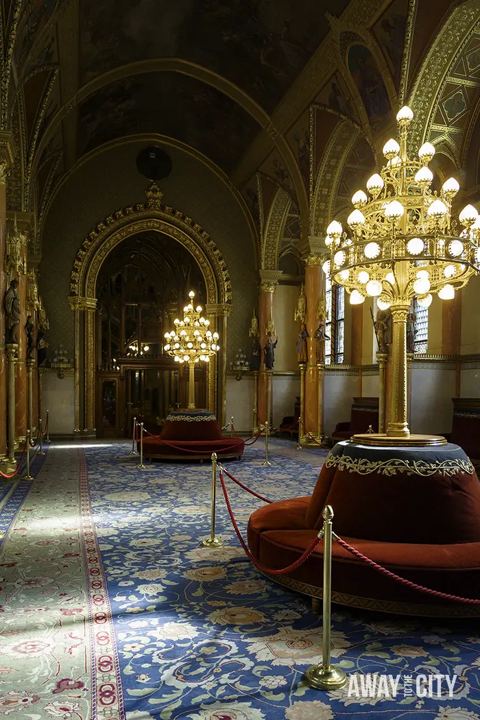 A view of the interior of the Hungarian Parliament Building in Budapest, capturing one of its meeting rooms.