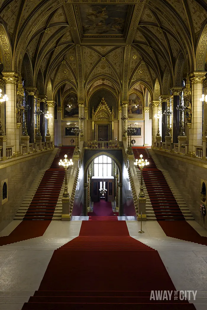 View of the grand staircase inside the Hungarian Parliament Building in Budapest.