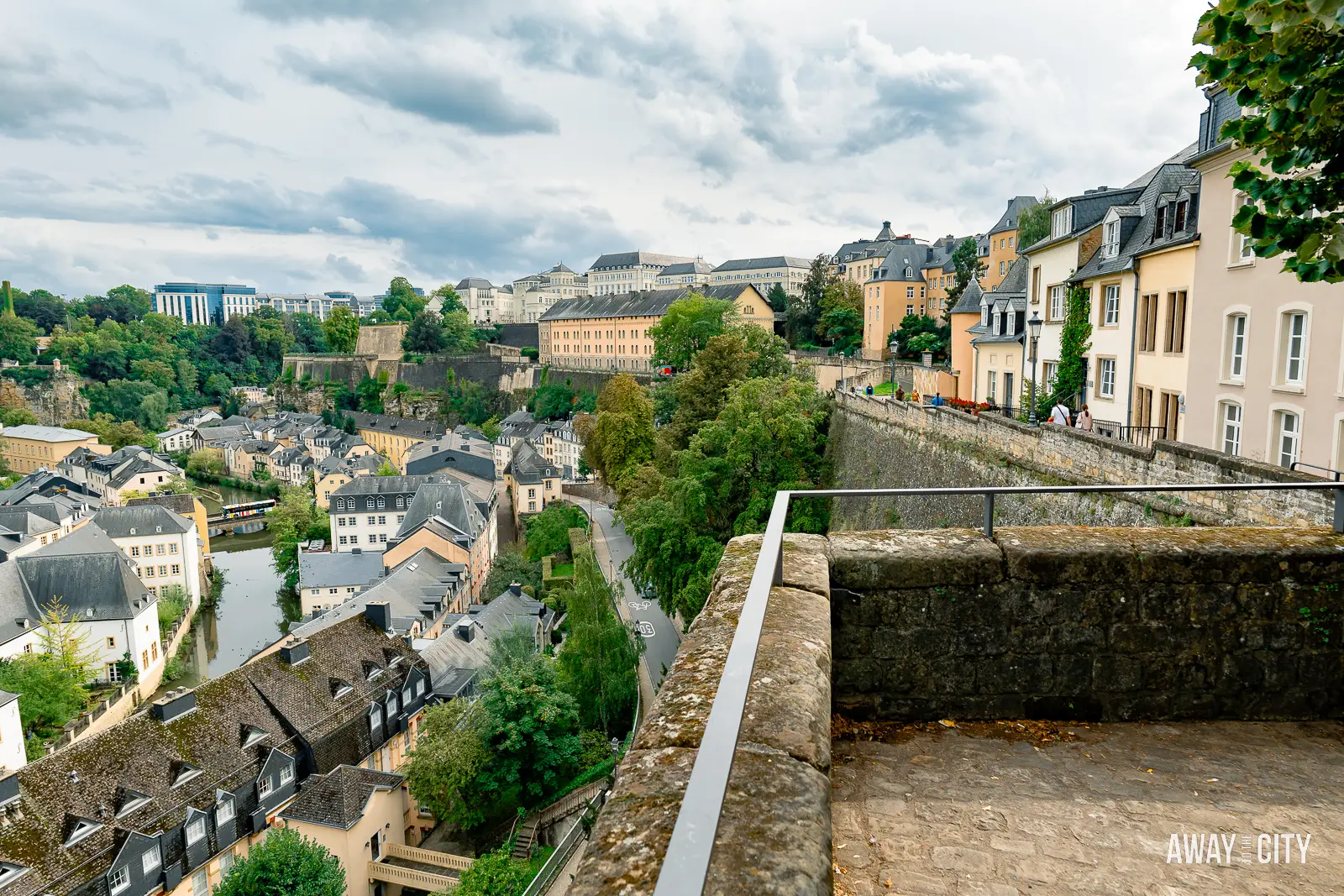 A view of the Grund District in Luxembourg City from Chemin de la Corniche, a scenic balcony walkway