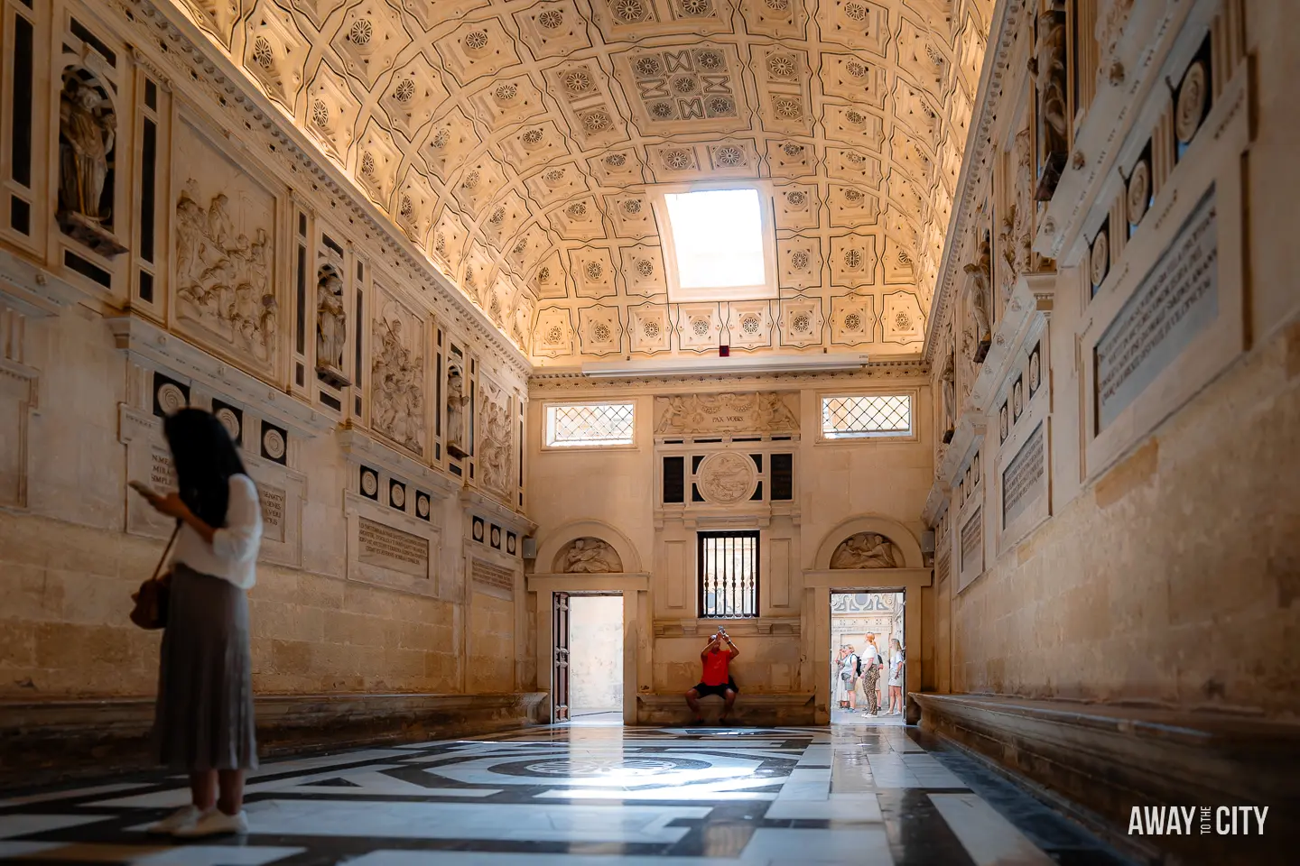 An antechamber inside Seville Cathedral, offering a glimpse into the cathedral's elegant interior.