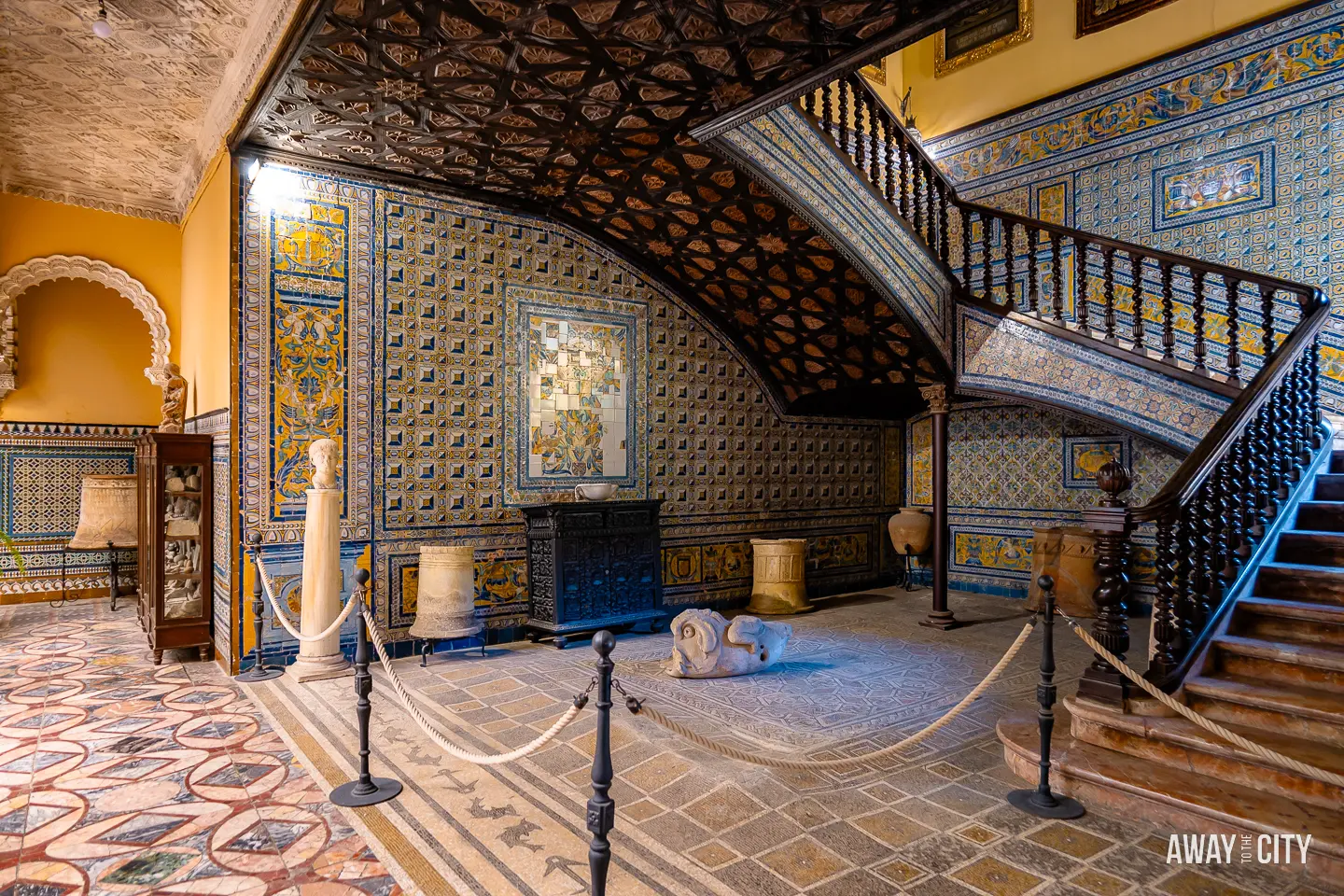 The tiled staircase of the Palace of the Countess of Lebrija in Seville and Roman mosaics.