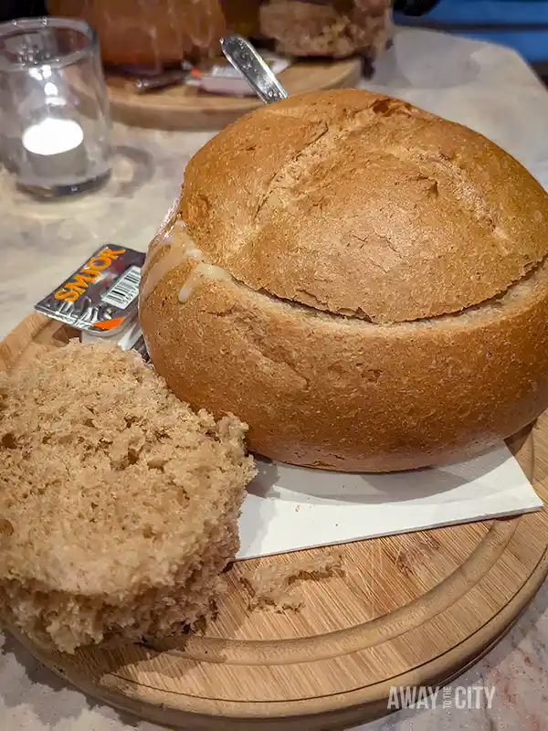 A soup in a bread bowl at Svarta Kaffið, known locally as the soup spot and one of the best restaurants to visit in Reykjavik in winter.