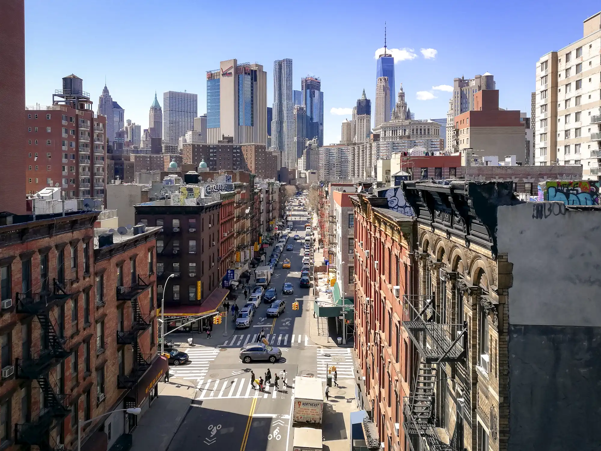 View of Lower Manhattan and Chinatown along Madison Street from Manhattan Bridge in New York City (NYC).