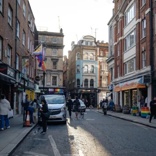 People on a street in Soho, London.