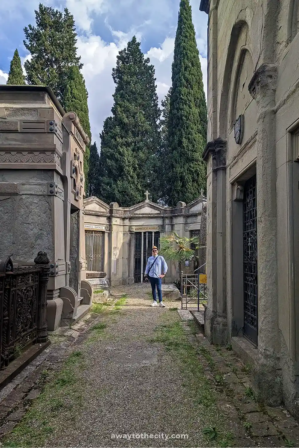 A person stands in the Basilica di San Miniato al Monte cemetery, a peaceful stop on a 2-day Florence itinerary.