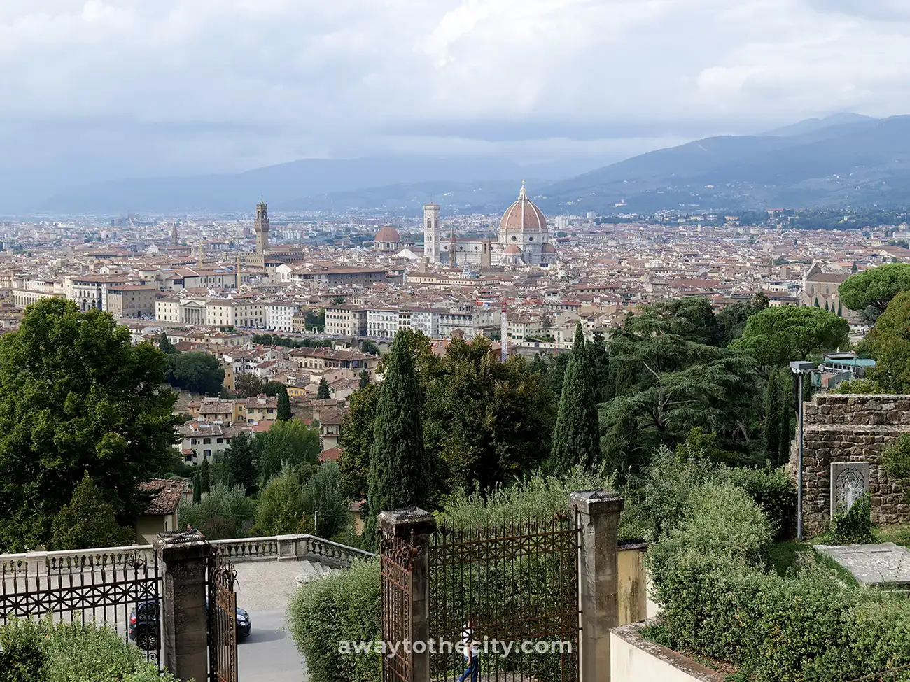 From San Miniato al Monte, a panoramic view showcases Florence, including the Florence Cathedral, a highlight of any 2-day itinerary.
