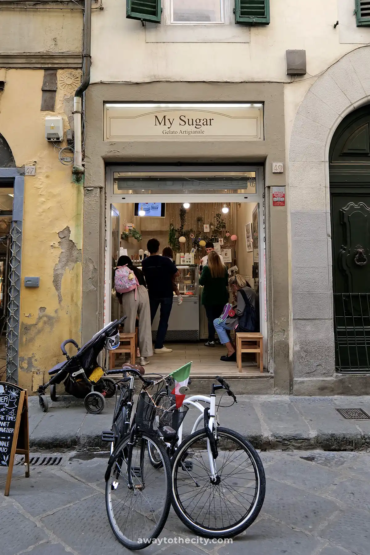 The inviting storefront of My Sugar Gelateria, with bicycles parked outside.