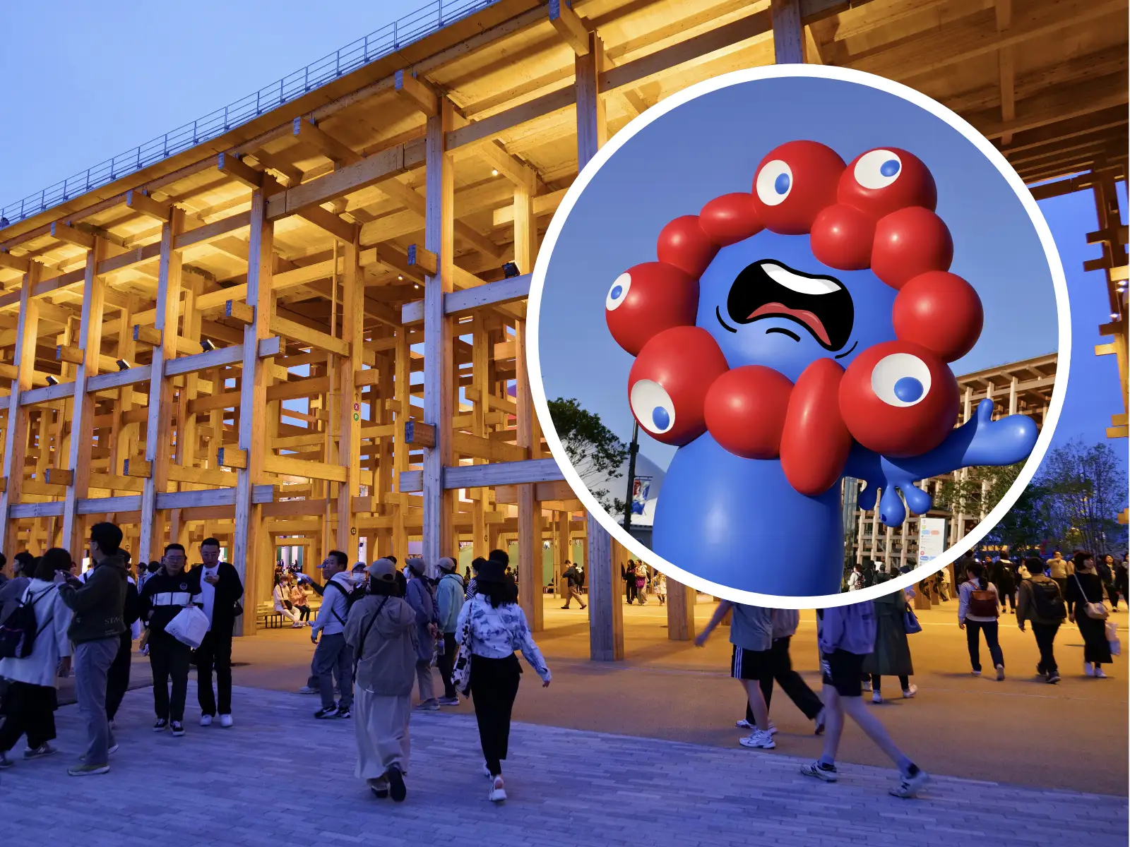 A large blue, red, and white mascot of Expo Osaka is superimposed over a lively scene of people walking near a towering wooden structure at sunset.