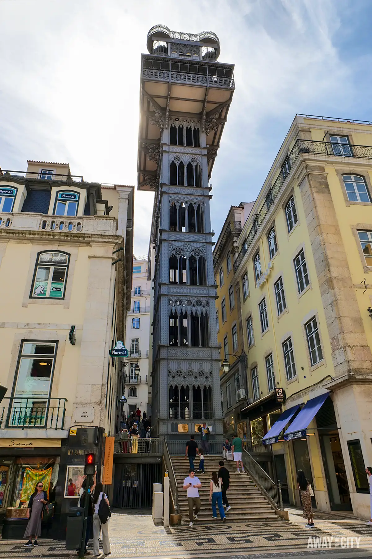 Santa Justa Lift rises between historic buildings in Lisbon, connecting the Baixa and Chiado neighbourhoods.