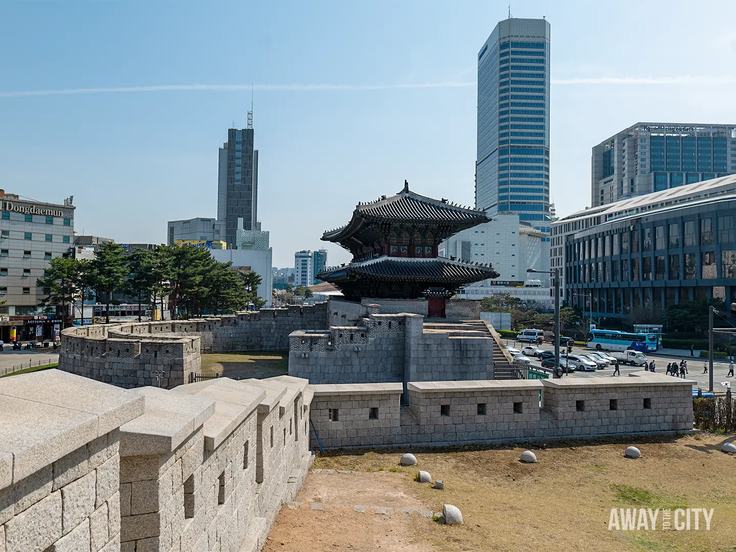 Historic stone walls and traditional gatehouse of Heunginjimun in Seoul, one of the best free things to do in Korea's capital.