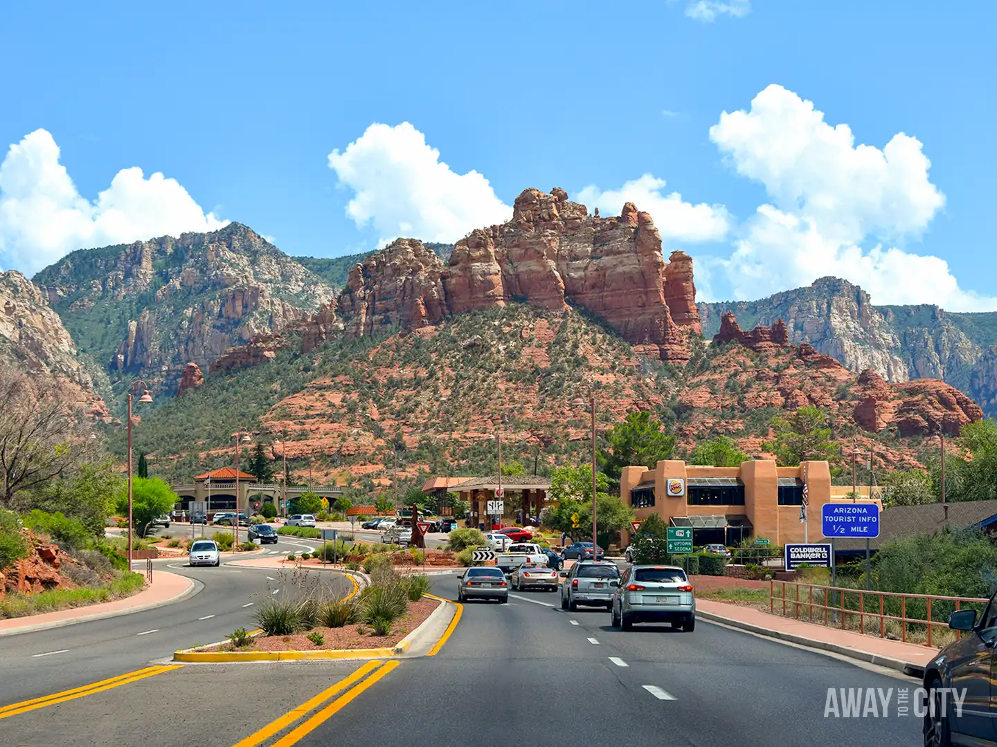 Street view from a car or campervan entering Sedona, Arizona, one of the best destinations for free travel when relocating a campervan.