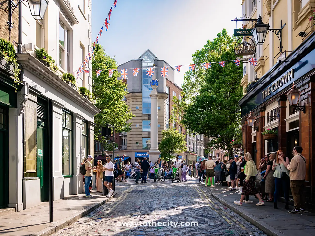An image of the Seven Dials area in London, known for its unique intersection and charming streets with shops and cafes.